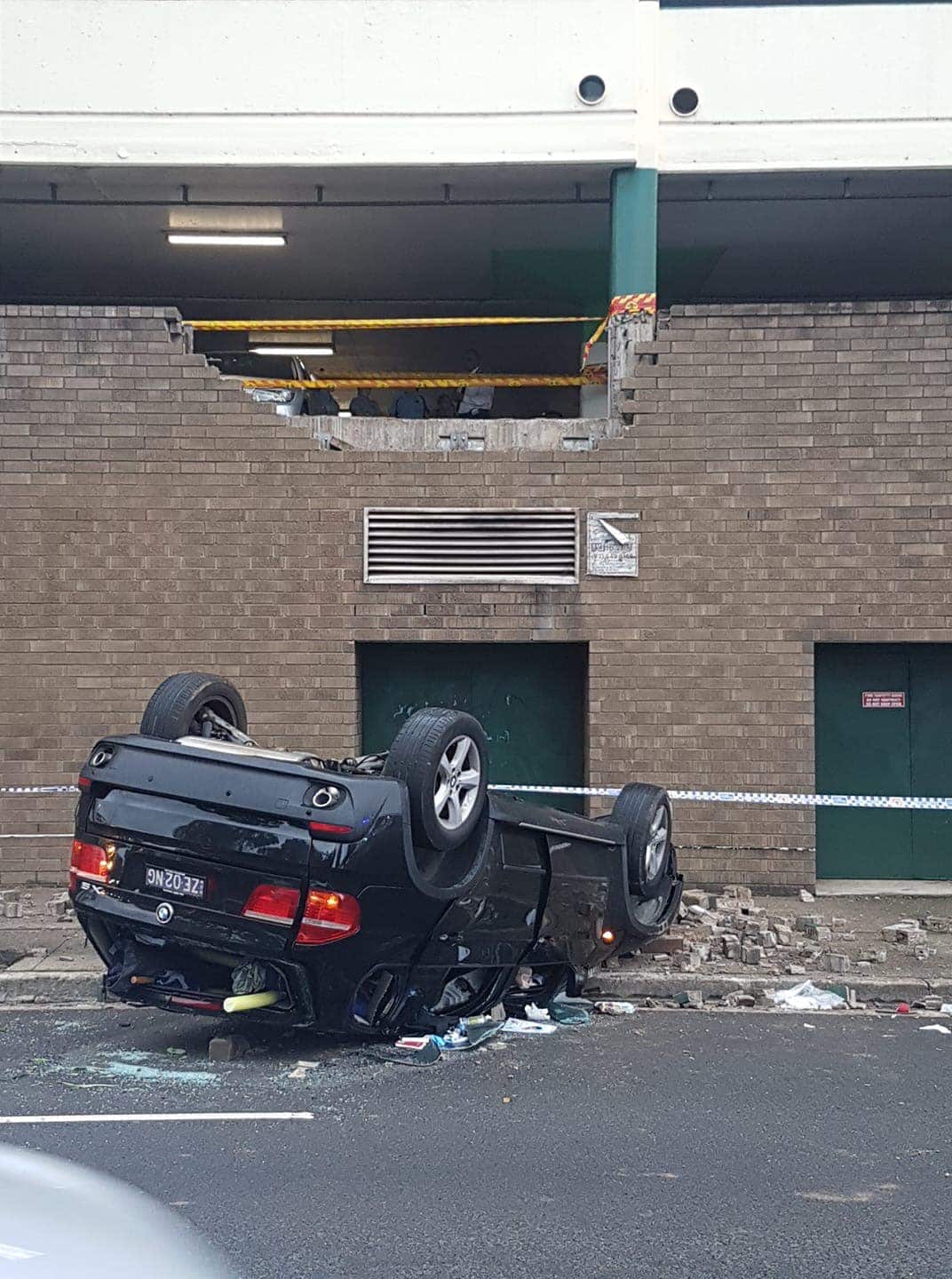 Driver crashes through Eastwood car park brick wall