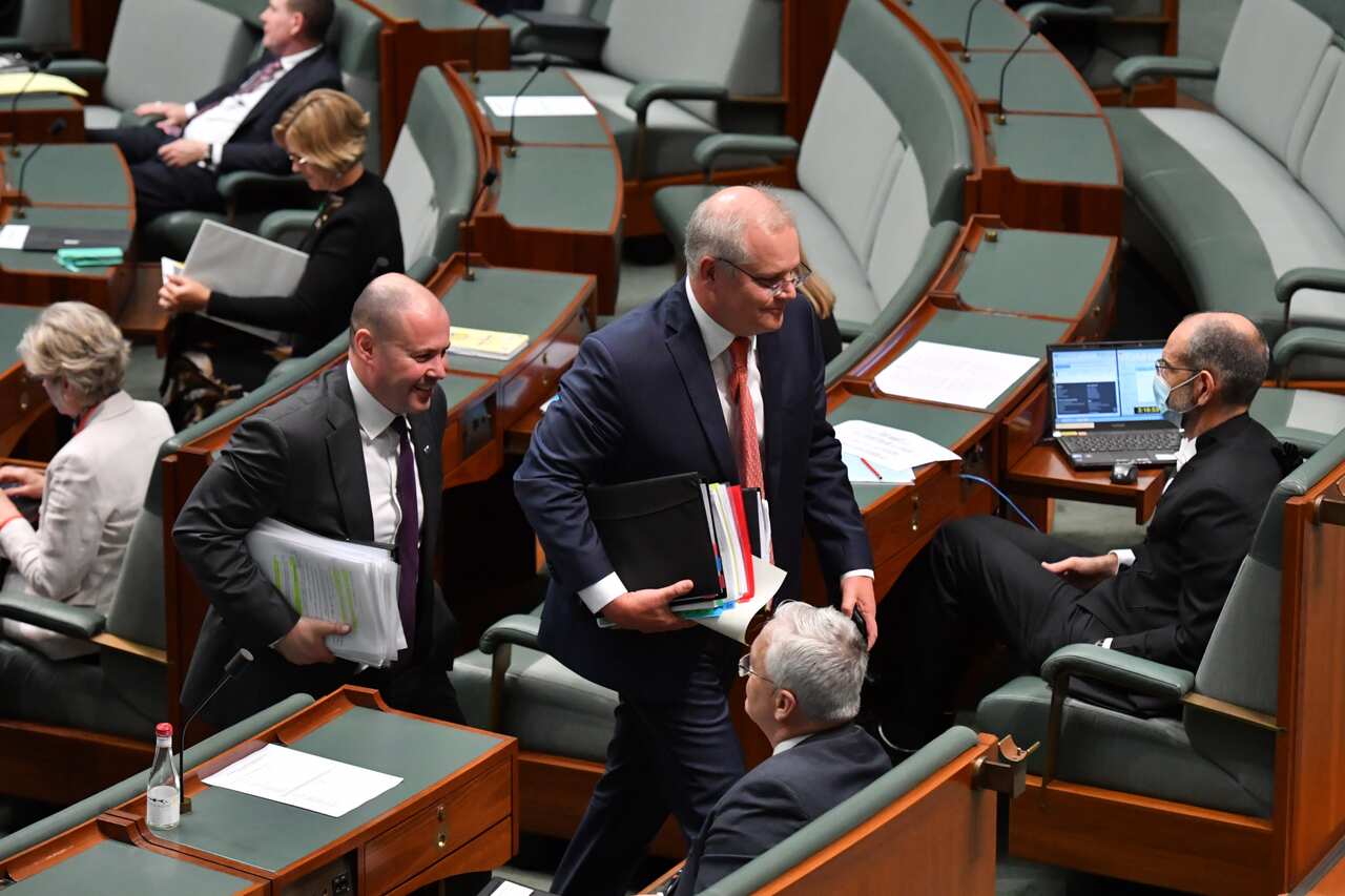 Treasurer Josh Frydenberg and Prime Minister Scott Morrison leave after Question Time in the House of Representatives at Parliament House in Canberra, Thursday, October 8, 2020. (AAP Image/Mick Tsikas) NO ARCHIVING