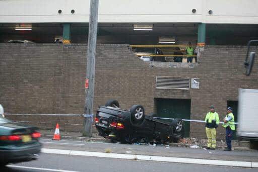 Driver crashes through Eastwood car park brick wall