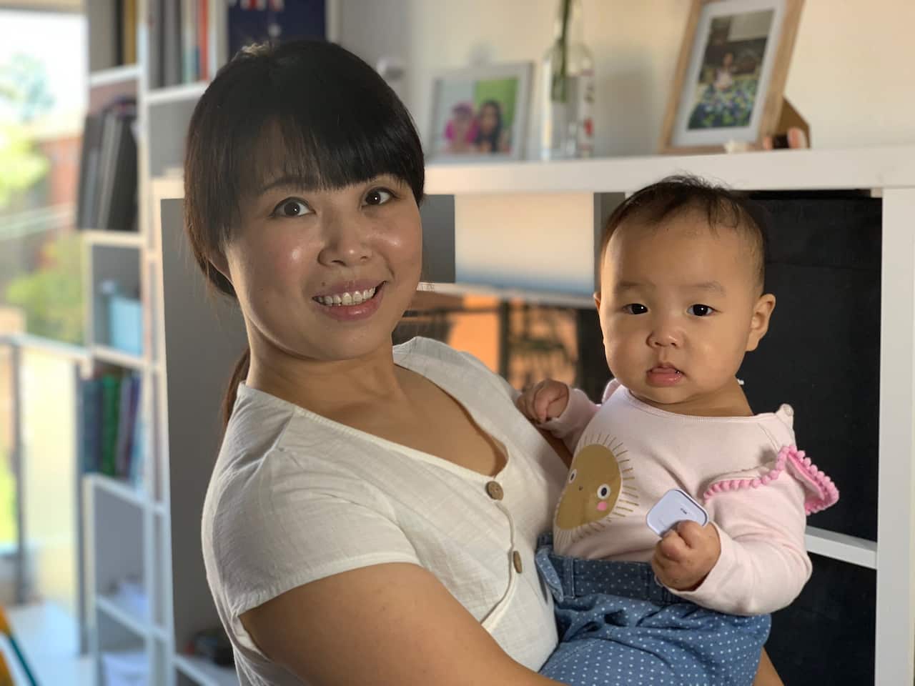 Olivia Zhu says the fees attached to the new parent visa places a lot of pressure on new migrants to Australia like her family. 
