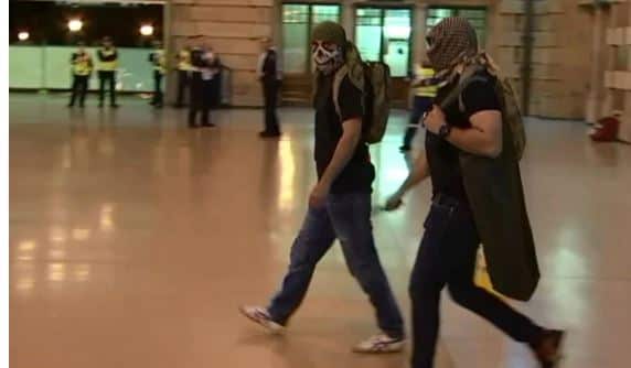 Police playing the part of terrorists, during the operation in Sydney's Central Station.