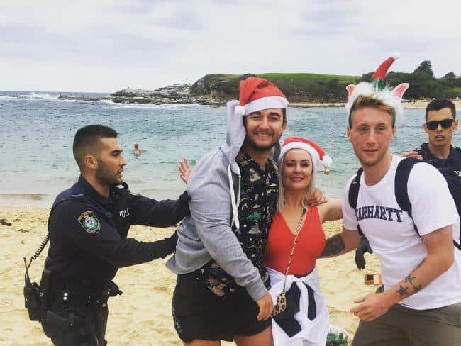 Revellers being moved on by police at Little Bay