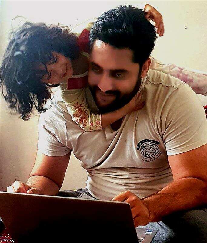 Liaqat Khan with one of his children.