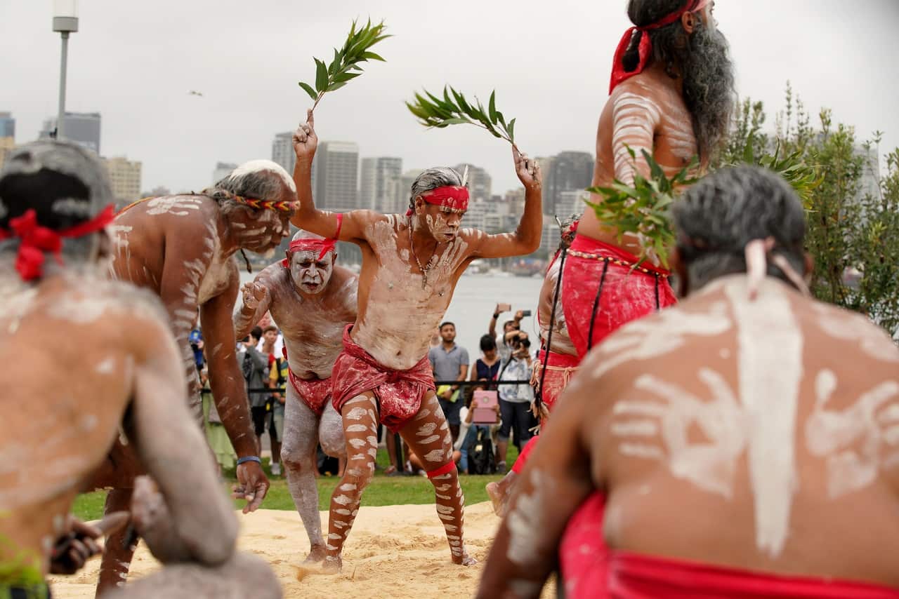 The Smoking Ceremony with Koomurri is performed during the Australia Day Wugulora Morning Ceremony on the Walumil Lawns at Barangaroo in Sydney, Friday, January 26, 2018. (AAP Image/Ben Rushton) NO ARCHIVING