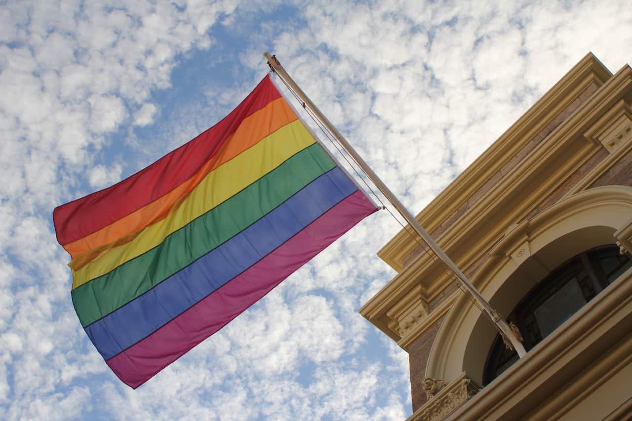 A rainbow pride flag flies on Broken Hill town hall in Broken Hill, Queensland, during the Broken Heel Festival, September, 2017. (AAP image/Rebecca Gredley) NO ARCHIVING