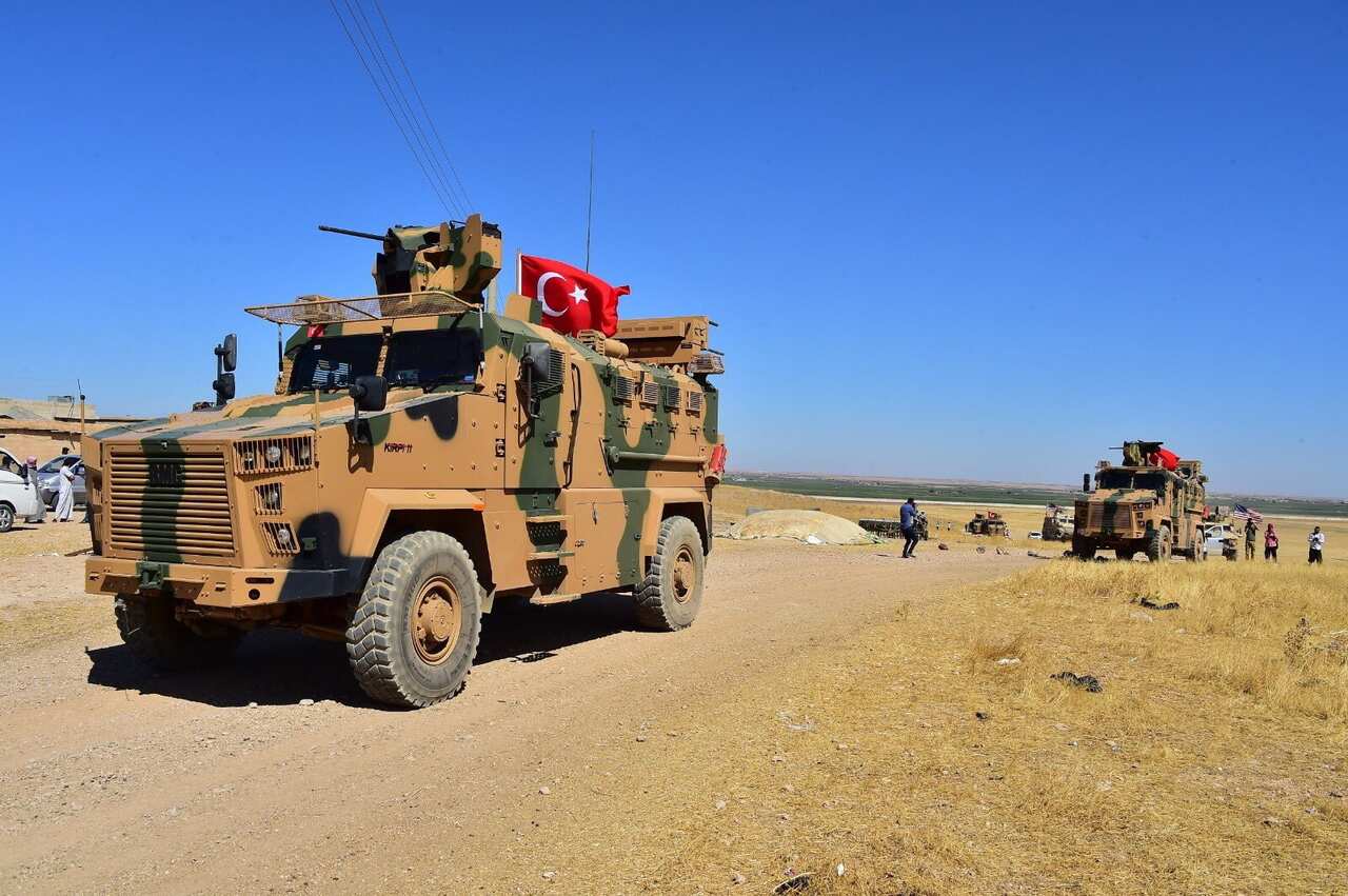  Turkish and US soldiers patrol together in Northern Syria, near Turkey border's, in September 2019. 