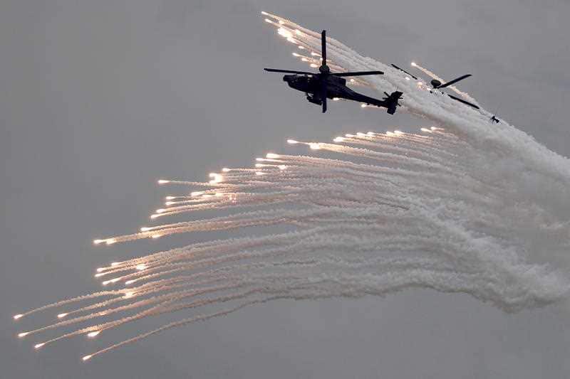AH-64E attack helicopters launch flares during the 36th Han Kuang (Chinese Glory) military exercise in Taichung, Taiwan, 16 July 2020
