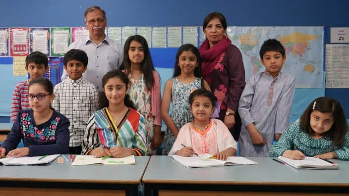 Students and teachers in Urdu class.
