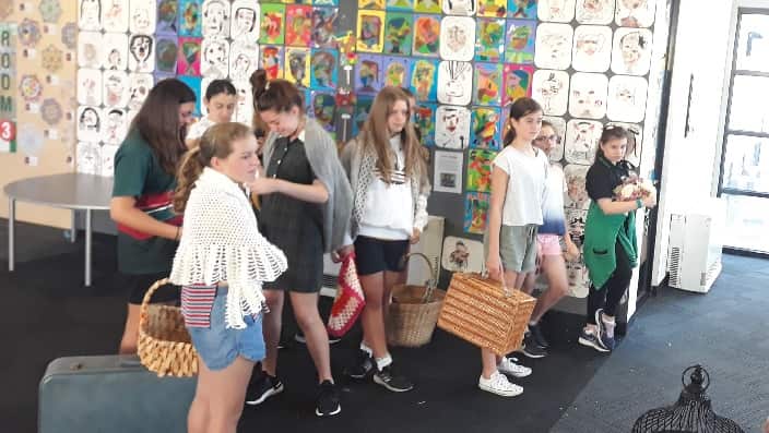 At the play rehearsals. 