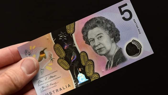A new Australia five dollar banknote is displayed in Sydney on Thursday, Sept. 1, 2016.(AAP Image/Paul Miller)