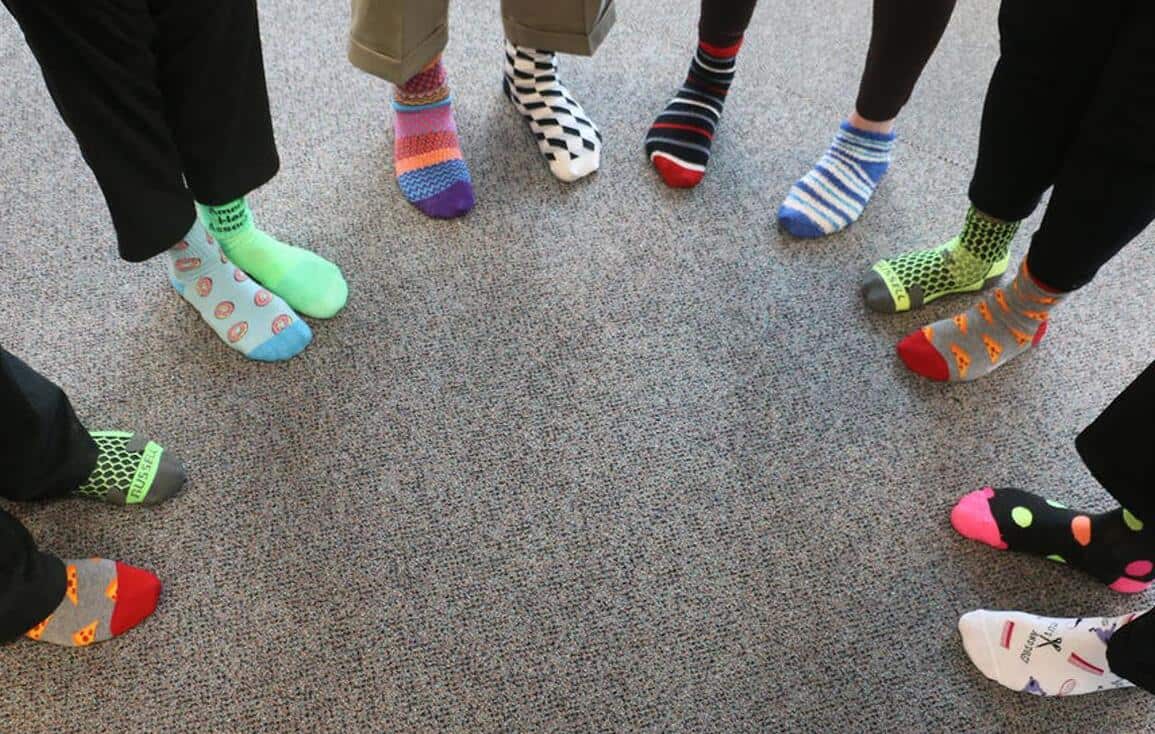 Why do people wear odd-coloured socks on World Down Syndrome Day?