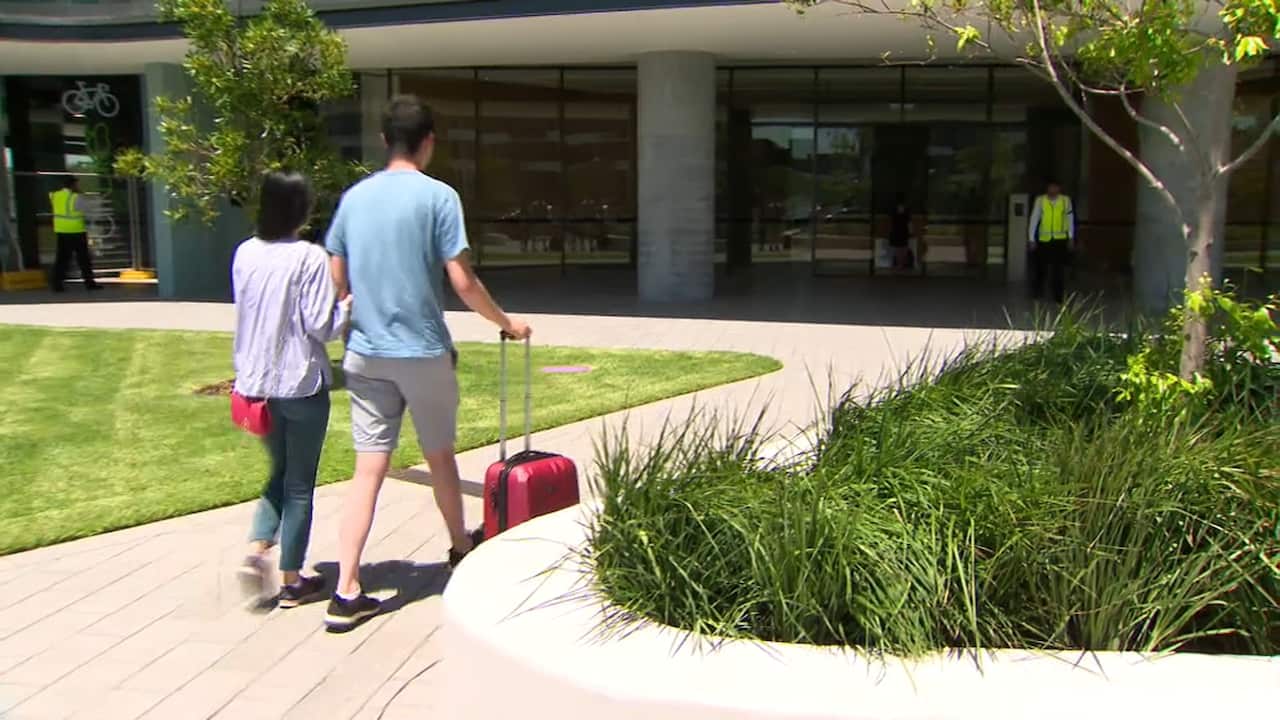 Some residents return to the Opal Tower.