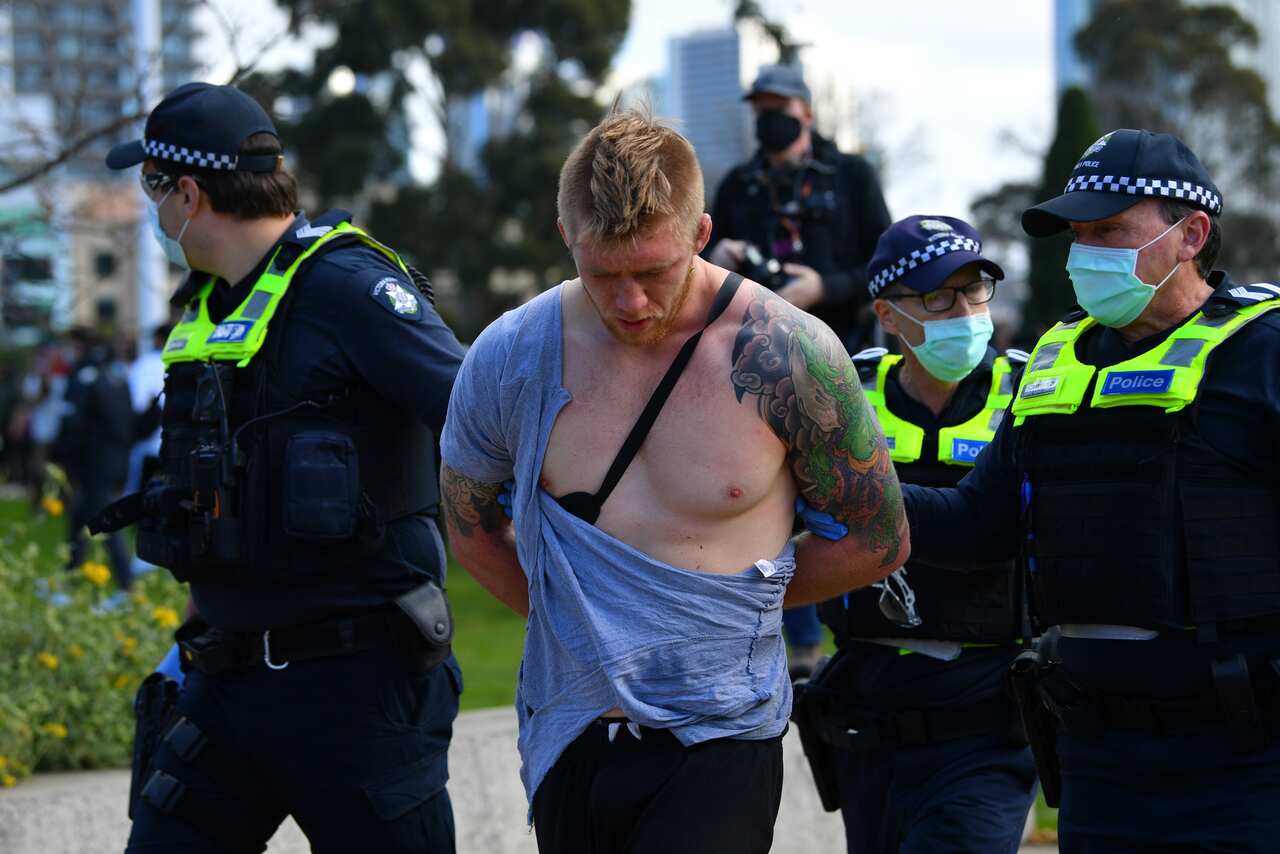 Protesters are seen at the Shrine of Remembrance in Melbourne, Saturday, September 5, 2020. Anti lockdown protests are planned at various locations in Melbourne CBD, including the Shrine of Remembrance.