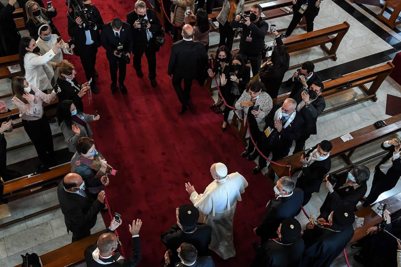 Pope Francis arrives at the Syro-Catholic Cathedral of Our Lady of Salvation in Baghdad, Iraq.