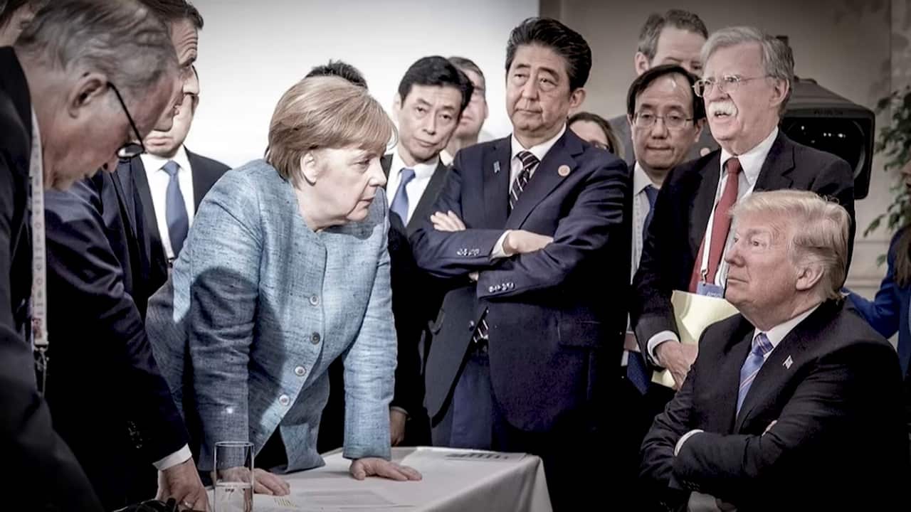German Chancellor Angela Merkel shared a striking photo of her and other world leaders confronting Donald Trump.