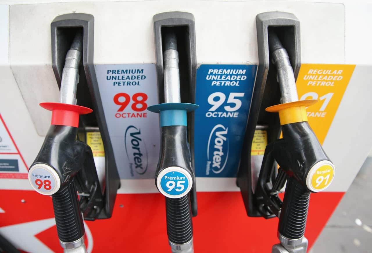 Fuel nozzles rest in a fuel dispenser at a petrol station on July 23, 2013 in Melbourne, Australia.