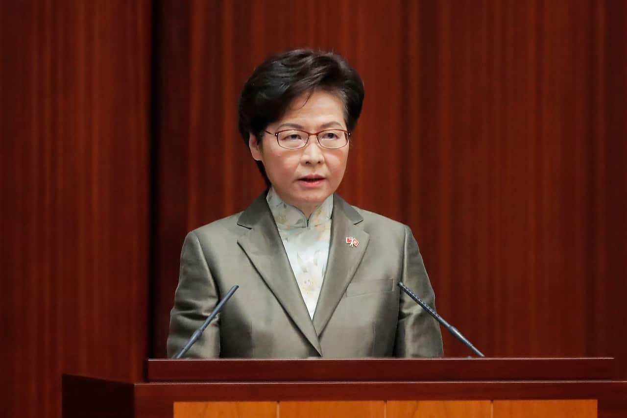 Hong Kong Chief Executive Carrie Lam delivers her policies at chamber of the Legislative Council in Hong Kong, Wednesday, Nov. 25, 2020