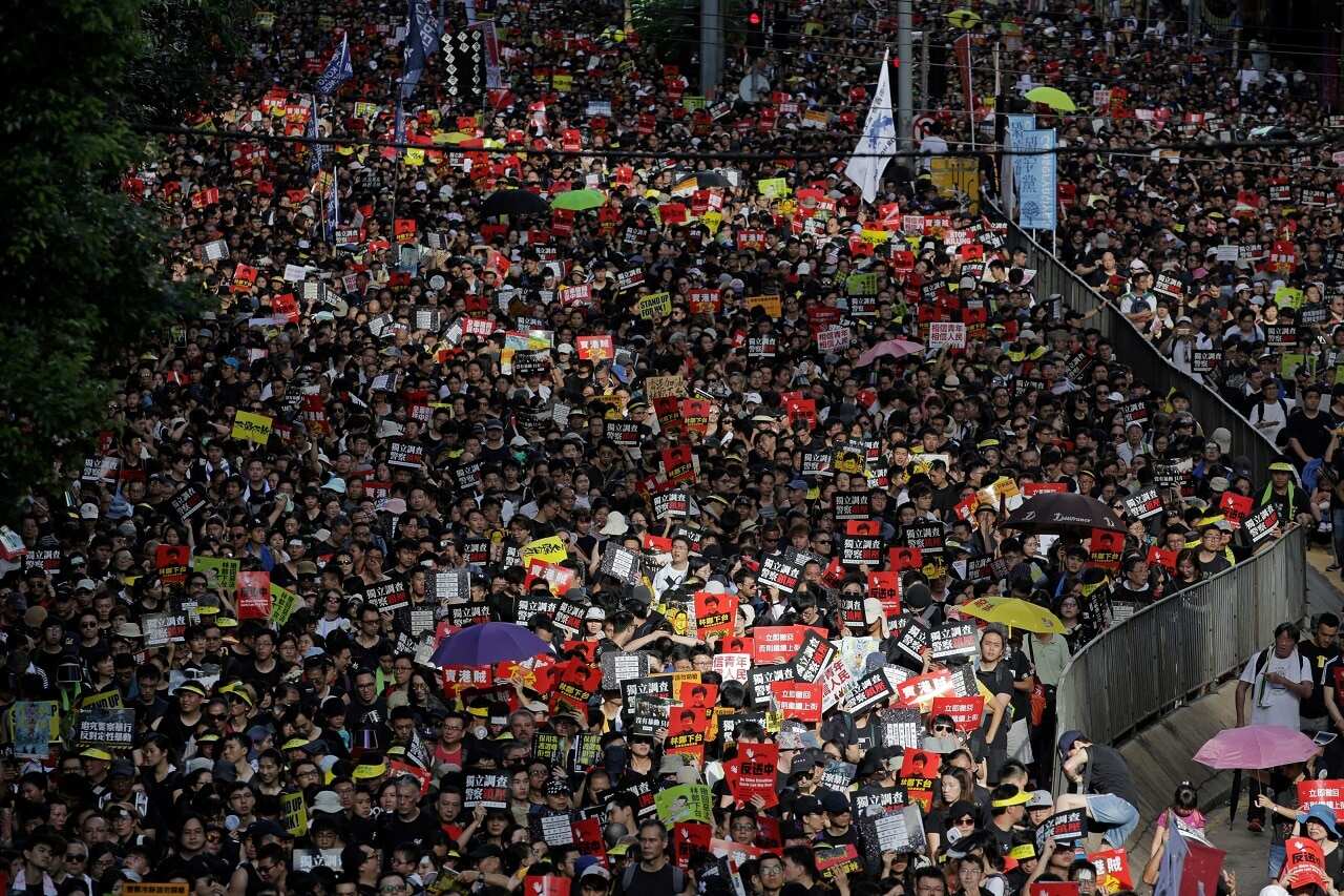 Protesters attend the annual pro-democracy rally in Hong Kong on July 1.