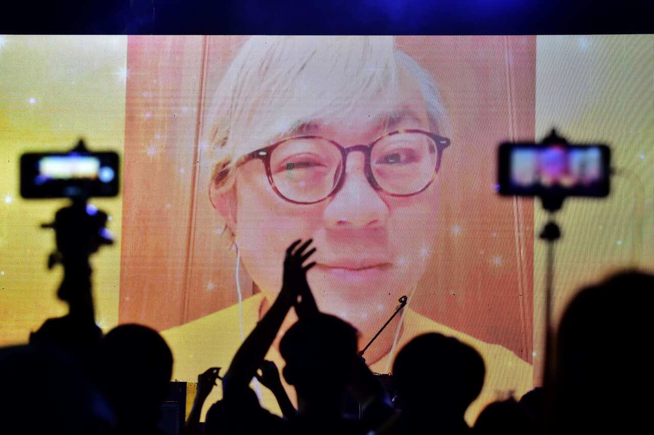 Pavin Chachavalpongpun address protesters through a live video call to condemn the military-aligned government of Thailand.