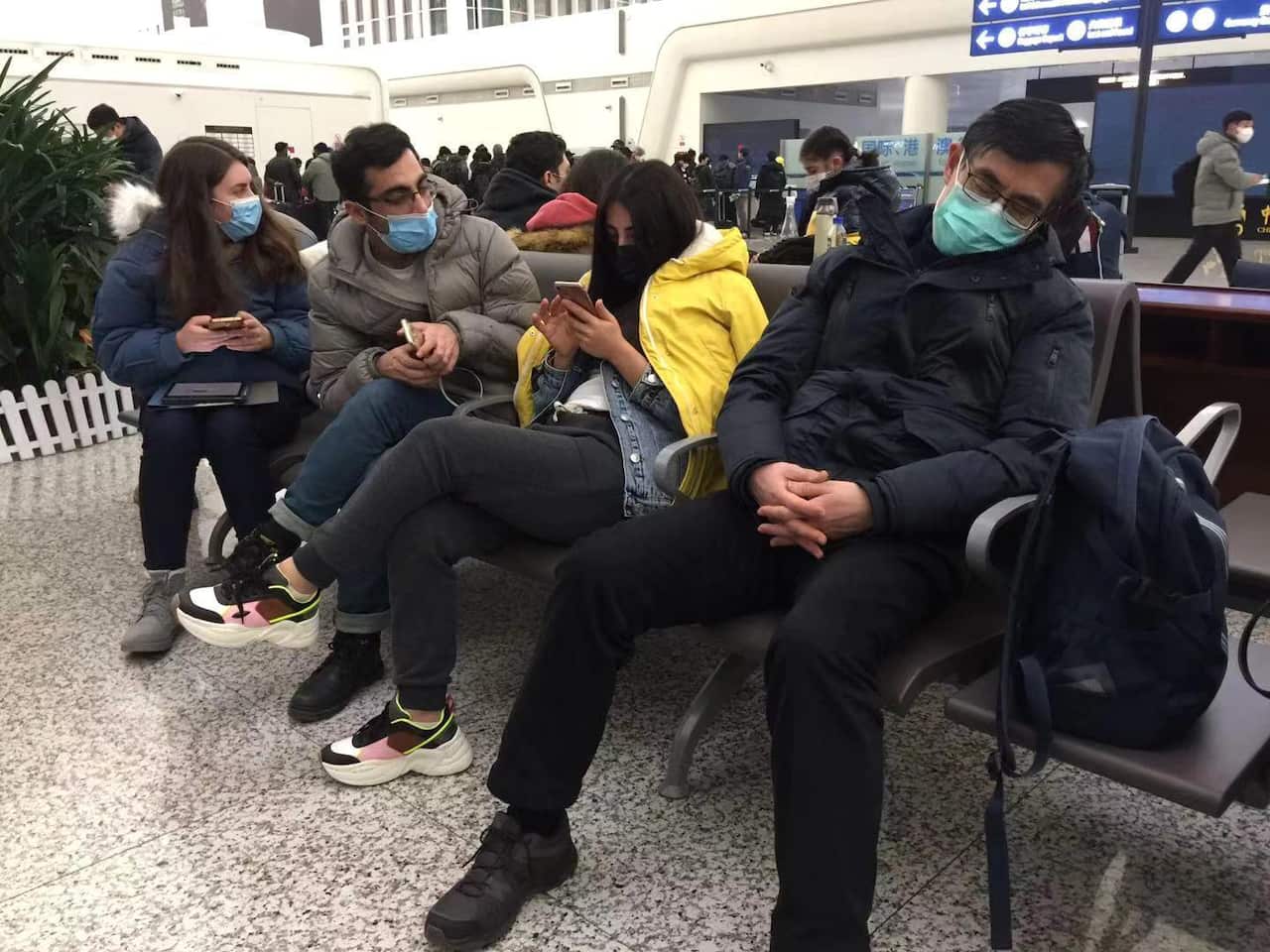 Turkish citizens arrive at Wuhan airport as a Turkish cargo plane prepares to evacuate groups from the Chinese city of Wuhan earlier this week. 