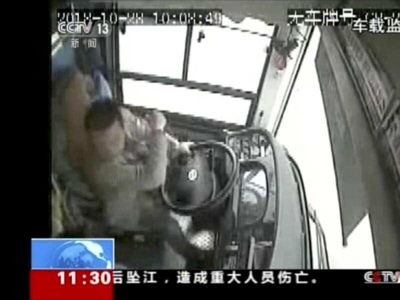 CCTV footage shows a bus driver hitting back at a passenger moments before the bus crash.  