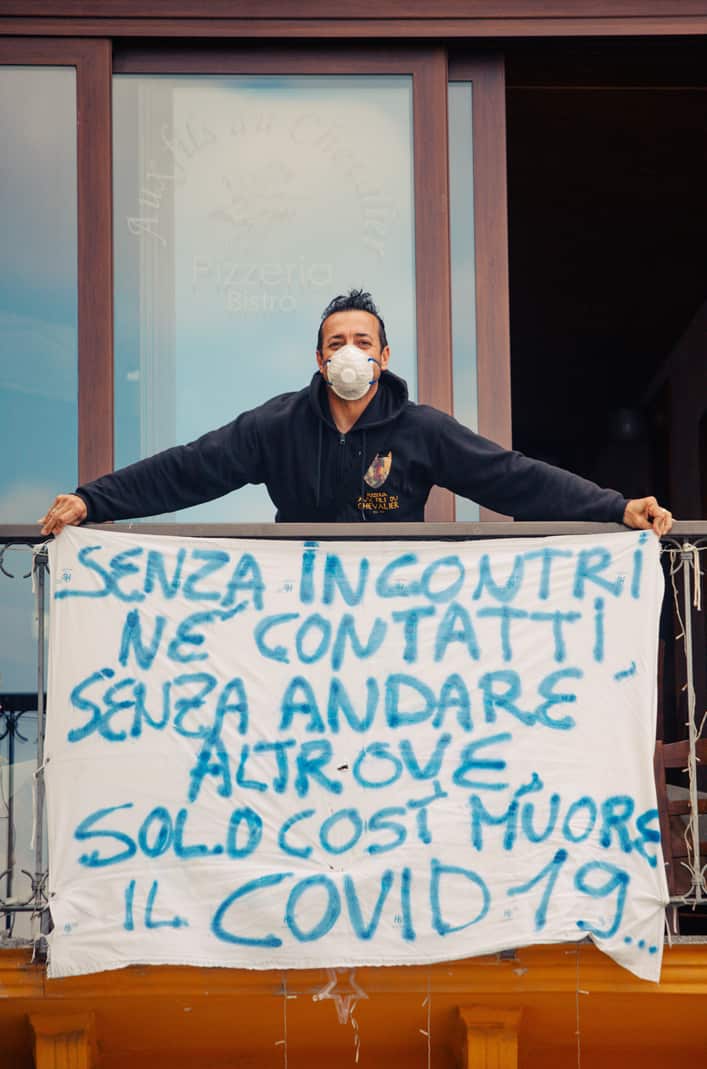 Man on a balcony in lockdown