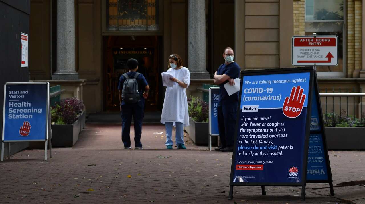 Staff wearing face masks outside the Royal Prince Alfred Hospital (RPA) in Camperdown, Sydney.