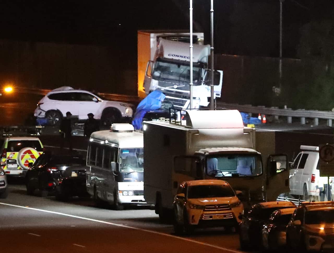 Emergency services respond to a collision on the Chandler Highway in the suburb of Kew in Melbourne.