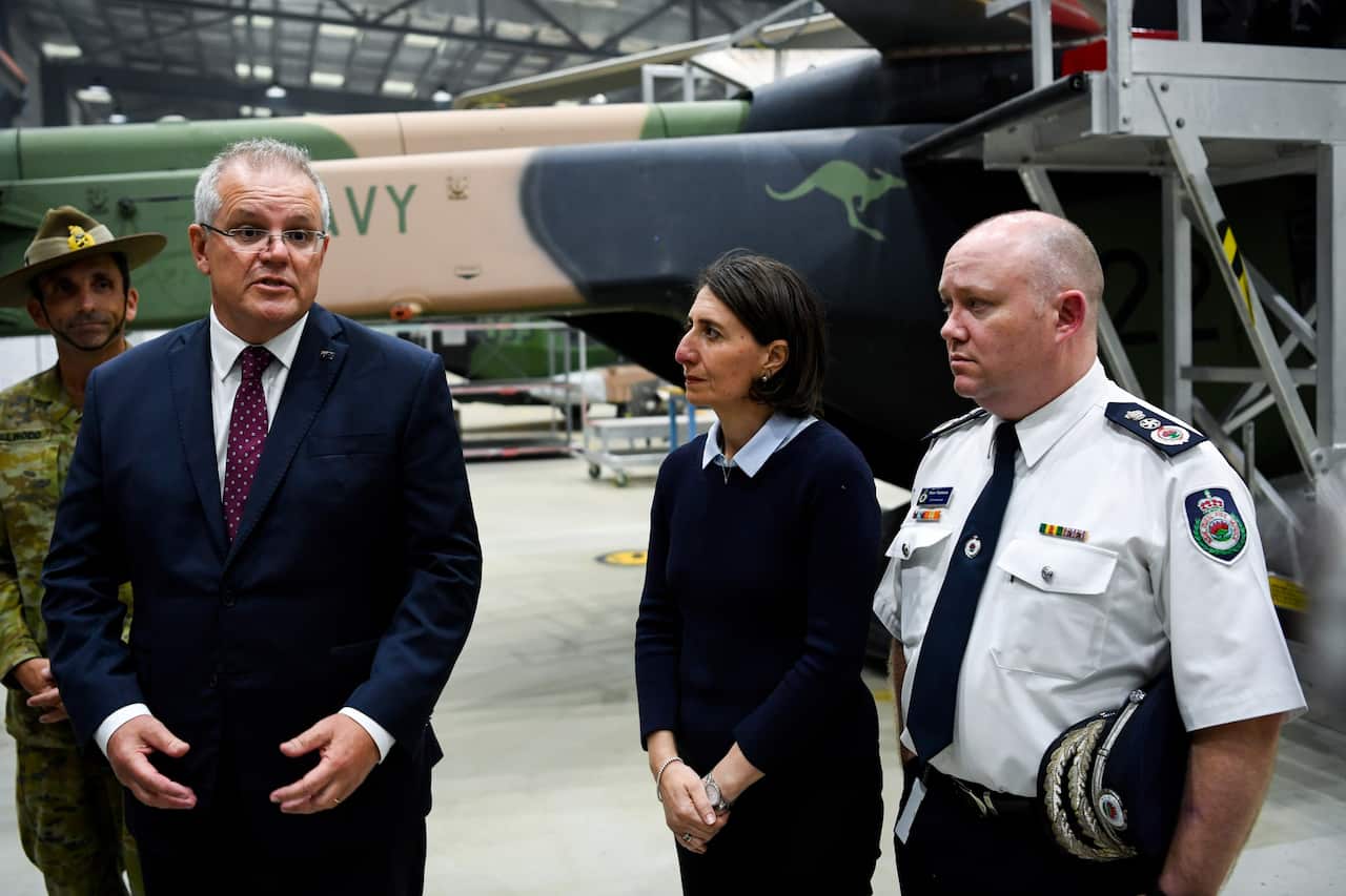 Australian Prime Minister Scott Morrison, NSW Premier Gladys Berejiklian and NSW RFS Commissioner Shane Fitzsimmons.