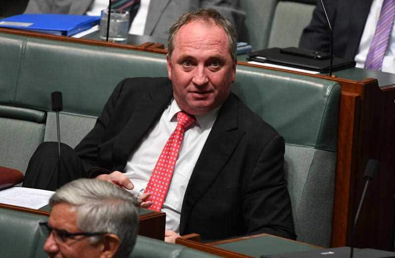 Barnaby Joyce sits on the backbench after his resignation.