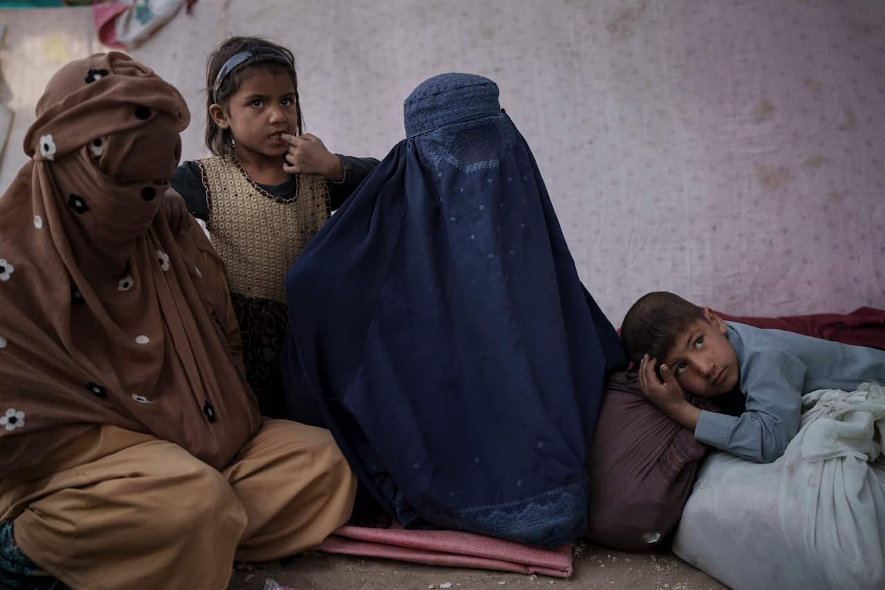 Women and children at a camp for internally displaced people in Kabul, Afghanistan, Saturday, Oct. 9, 2021.