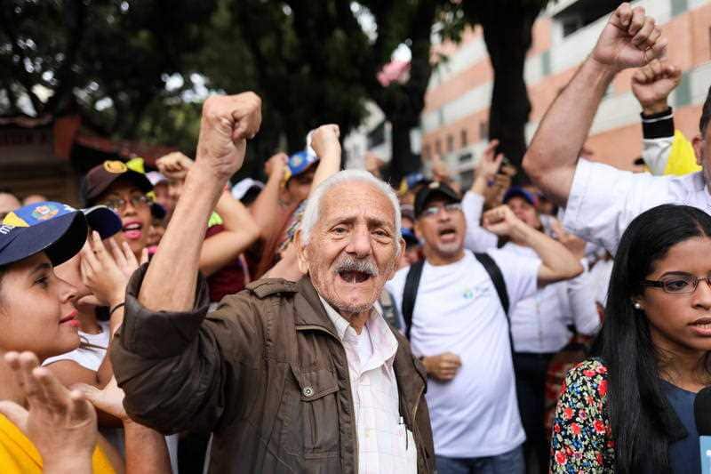 Anti-Maduro protesters attend a rally to protest against the Venezuelan President in Caracas, Venezuela on 23 January 2019. 