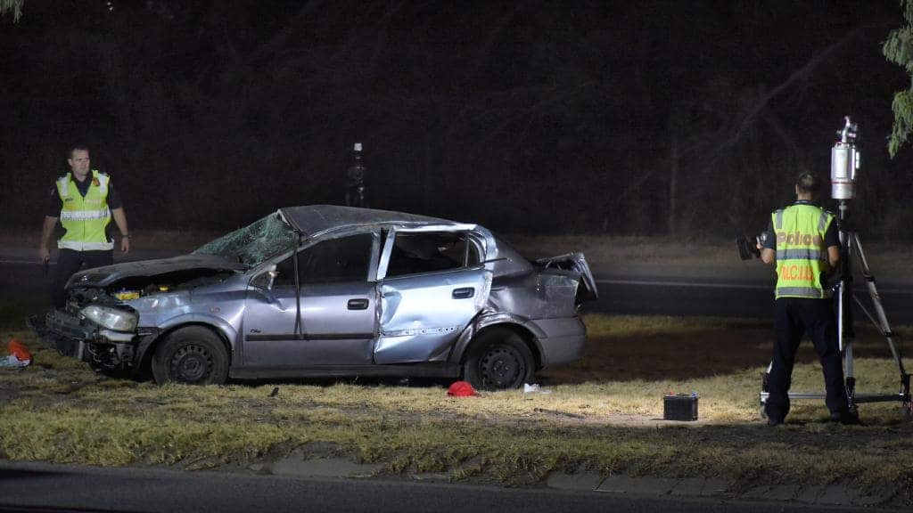 A baseball cap was among the items strewn across the median strip.