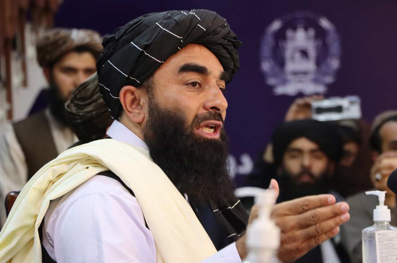 Zabihullah Mujahid, Taliban spokesman, talks with journalists during a press conference in Kabul, Afghanistan, 17 August 2021.