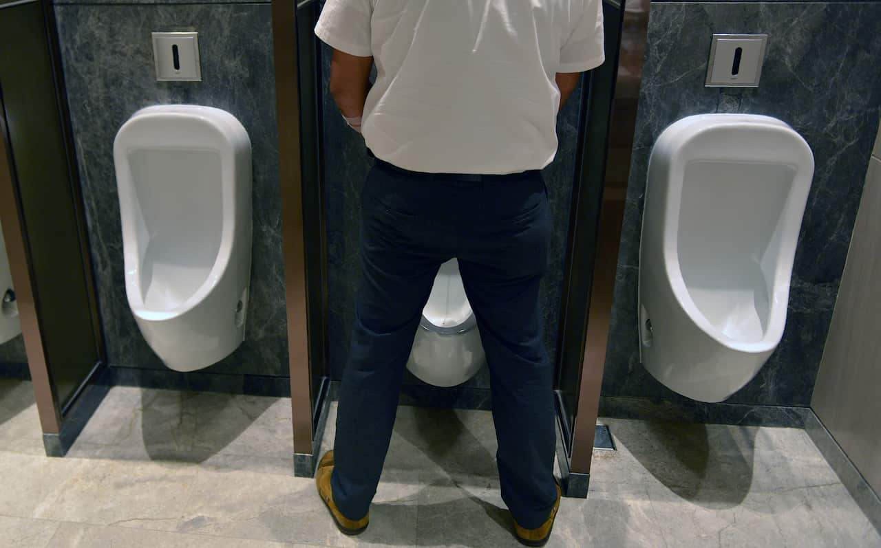 A Sri Lankan resident uses a public toilet in Colombo on November 16, 2017. / AFP PHOTO / ISHARA S. KODIKARA        (Photo credit should read ISHARA S. KODIKARA/AFP/Getty Images)