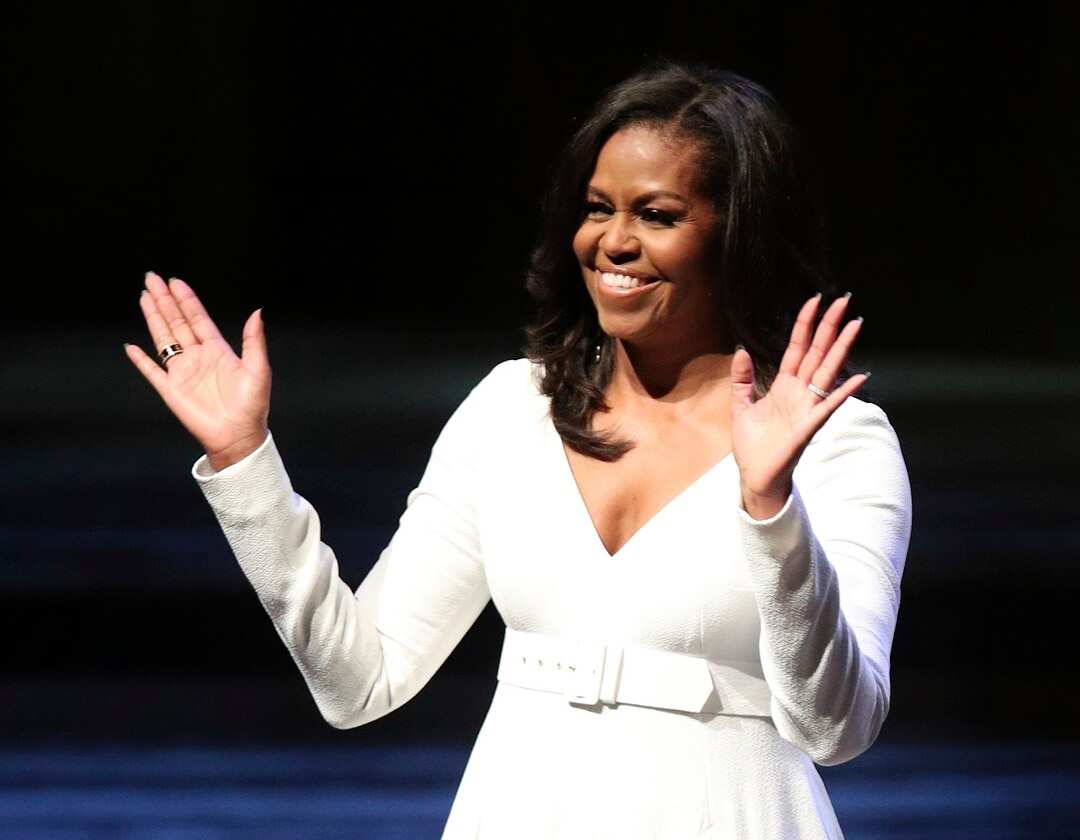 Michelle Obama acknowledges the crowd during her visit to the UK to publicize her memoir Becoming, at the Royal Festival Hall in London, Monday, Dec. 3, 2018. (Yui Mok/PA via AP)