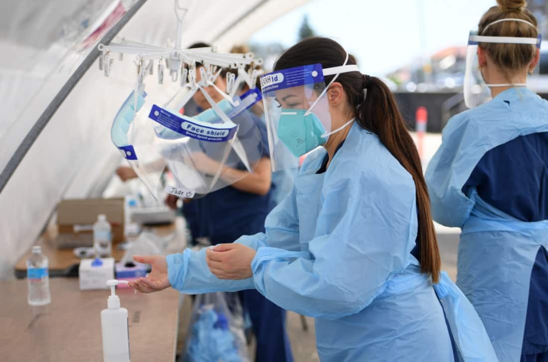 Nursing staff are seen at a coronavirus testing facility at Bondi Beach in Sydney, Thursday, October 15, 2020.