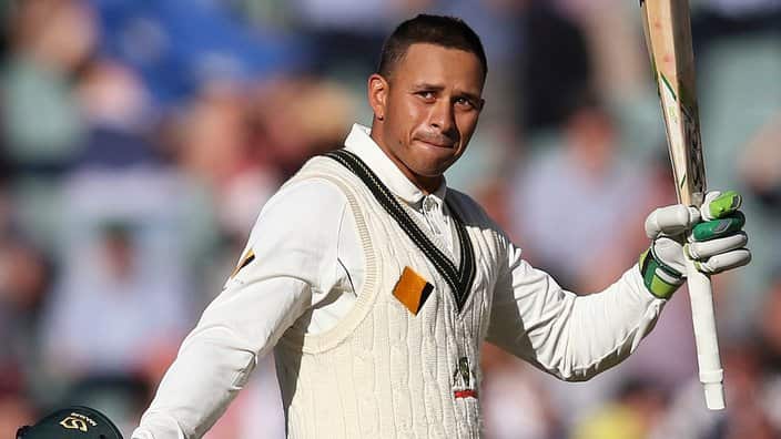 Australia's Usman Khawaja celebrates making 100