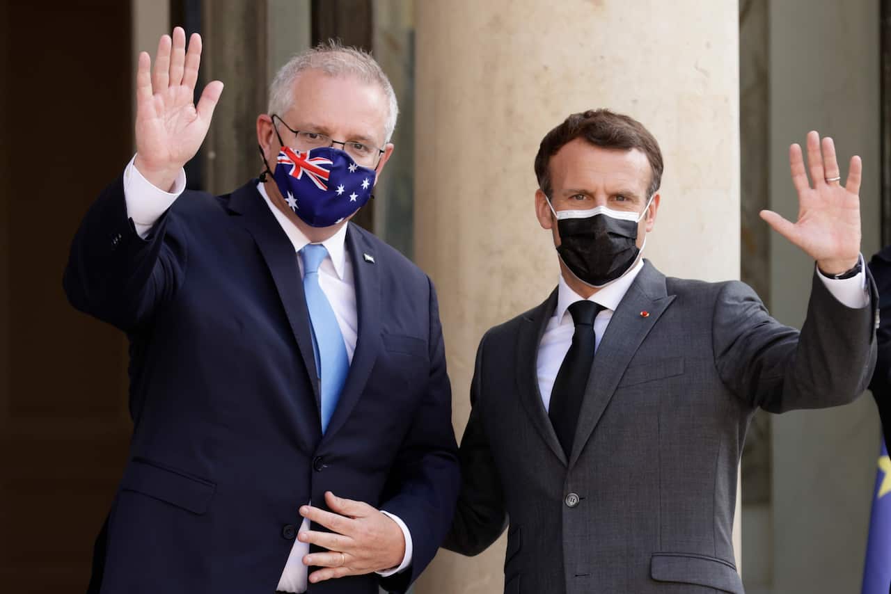 French President Emmanuel Macron greets Australian Prime Minister Scott Morrison upon his arrival at the Elysee Palace in Paris in June.