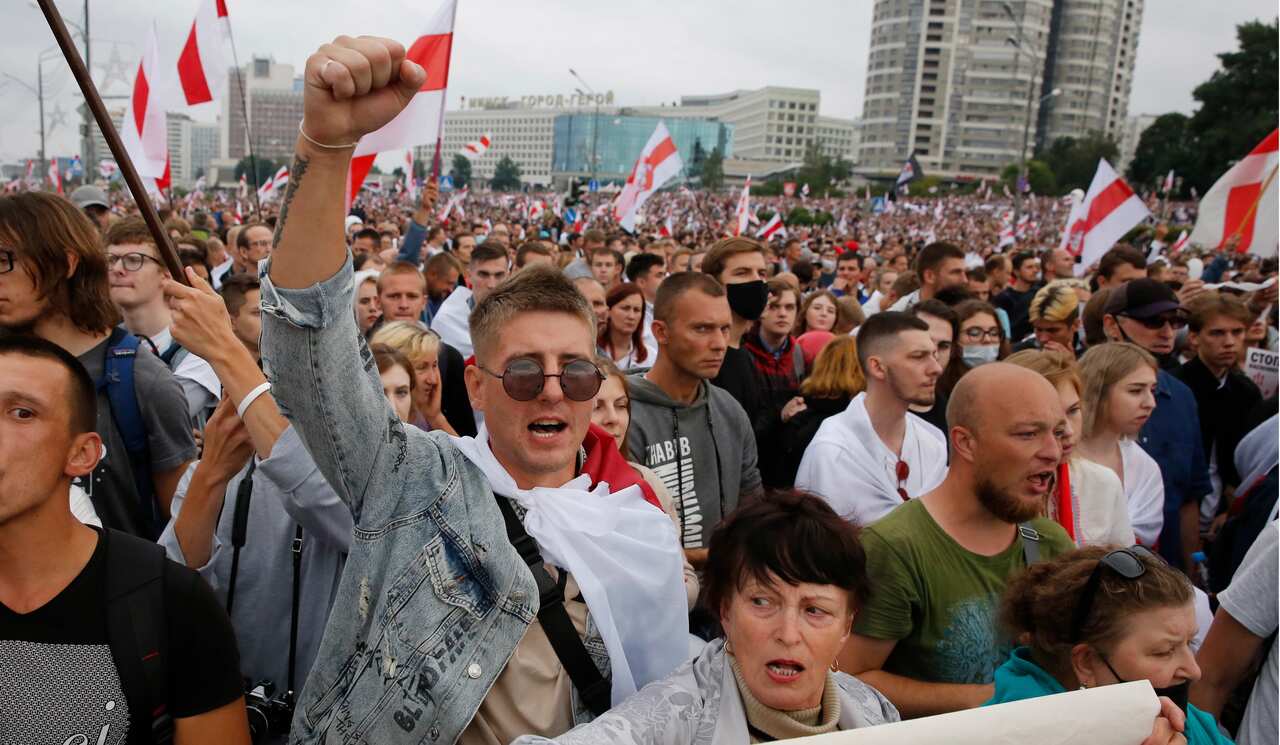 People shout slogans, as they attend a protest in Belarus earlier in the year.