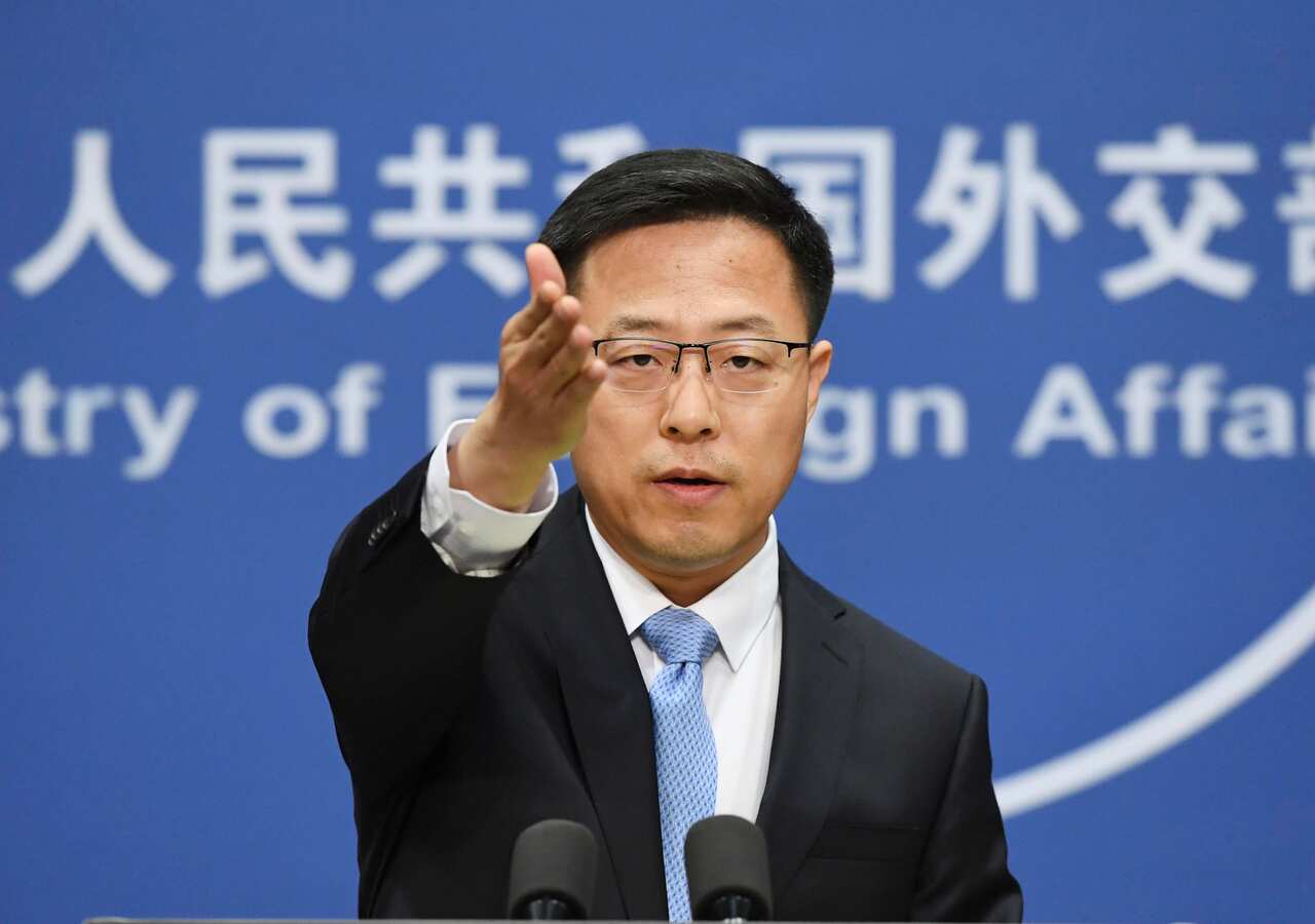 Chinese Foreign Ministry spokesman Zhao Lijian attends a press conference in Beijing.