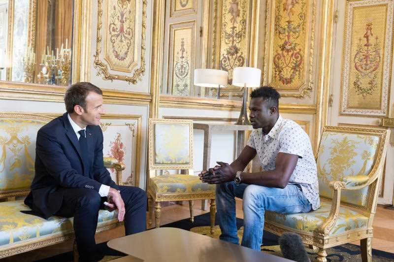 French President Emmanuel Macron receives Mamoudou Gassama, 22, from Mali, at the presidential Elysee Palace in Paris, France on May, 28, 2018