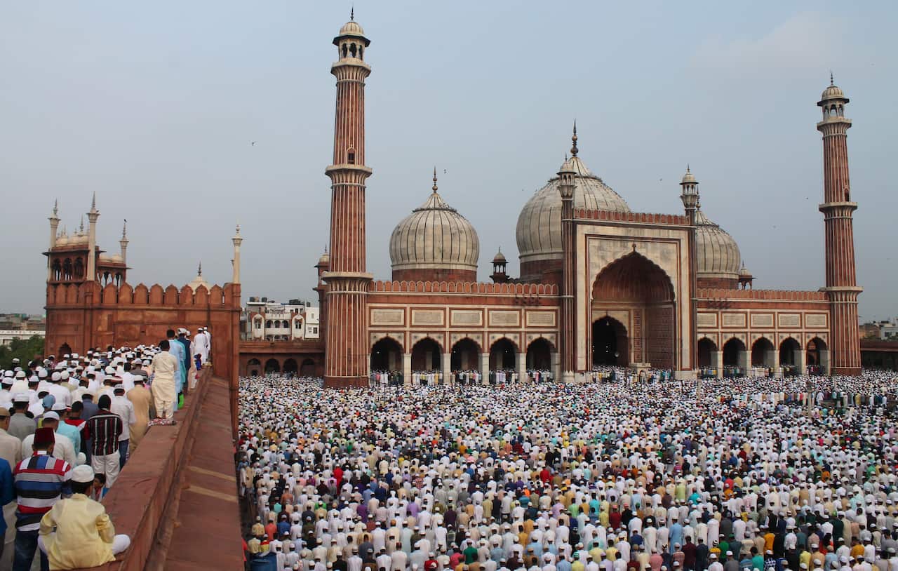 People offer prayers during Eid al-Fitr at the Jama Masjid mosque in New Delhi