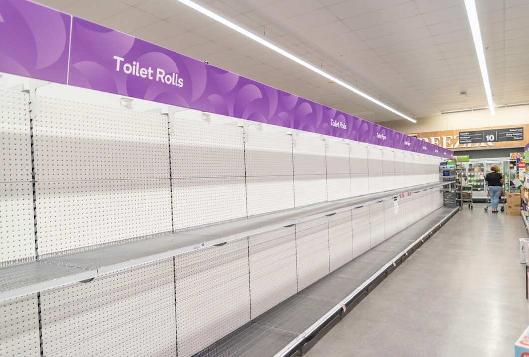 Empty supermarket shelves in March.