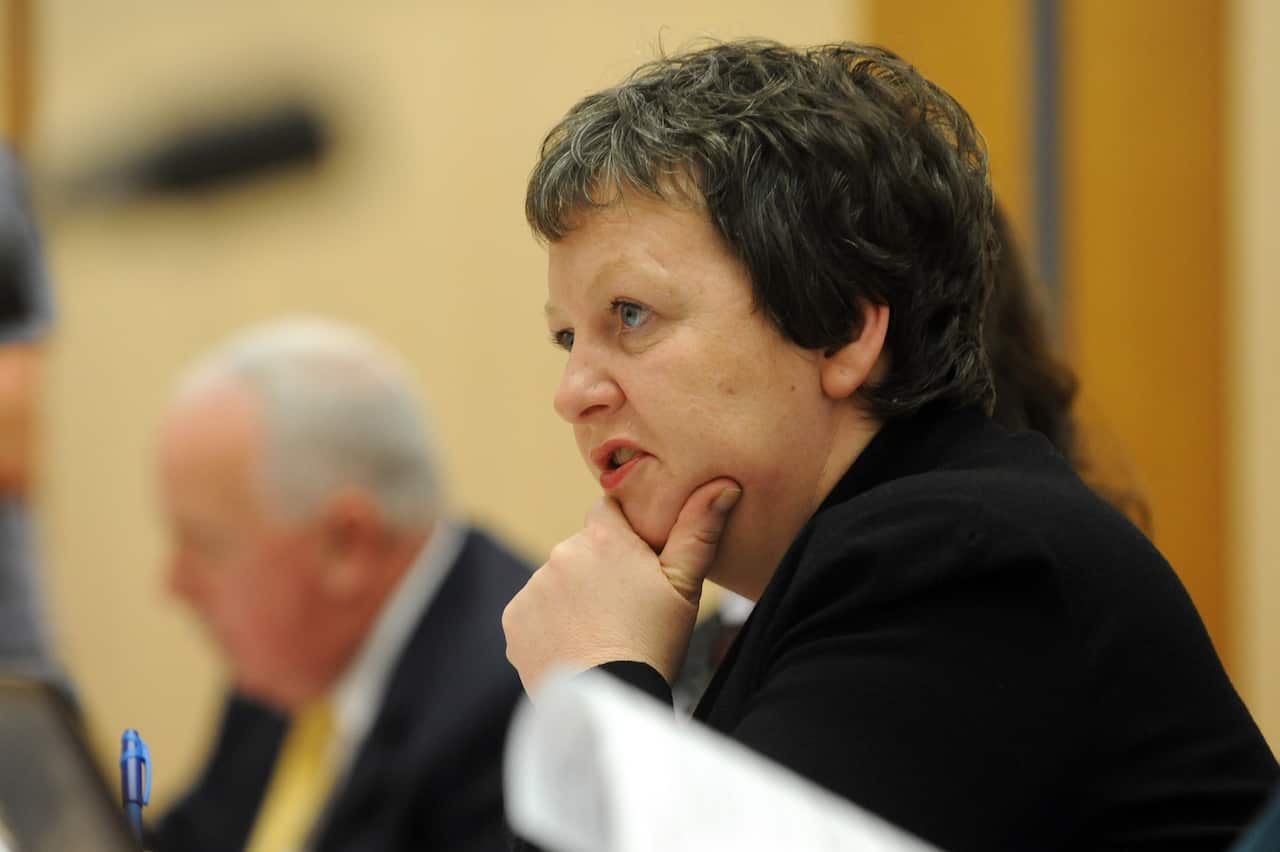 Fair Work Australia general manager Bernadette O'Neill listens at the Senate estimates Workplace Relations legislation committee hearing at Parliament House in Canberra, Wednesday, Oct. 17, 2012. (AAP Image/Alan Porritt) NO ARCHIVING