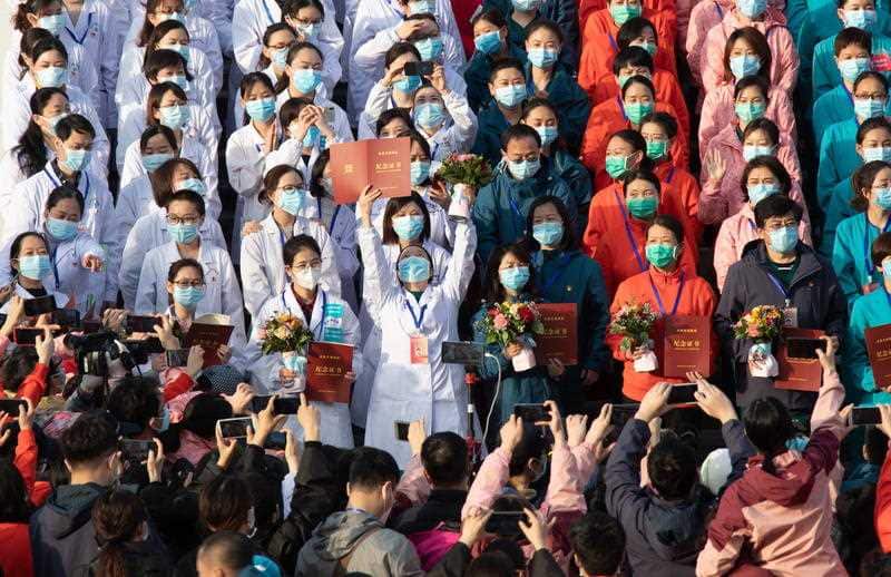 Medical staff after patients were discharged at Wuchang Fangcang Hospital, a temporary hospital treating people infected with the coronavirus