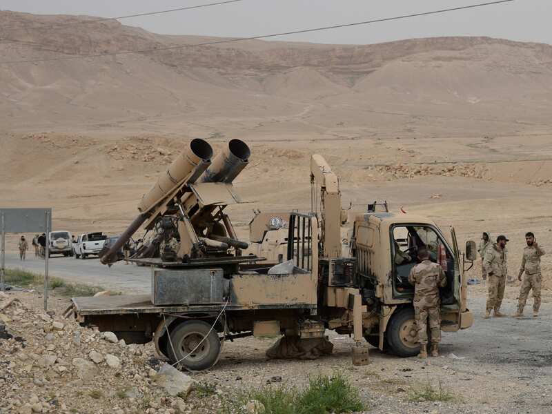 Syrian government's army troops and Desert Falcons militia