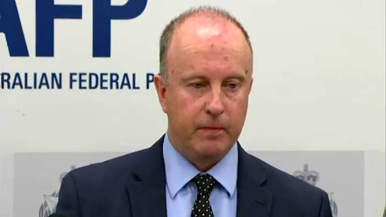 The AFP's Neil Gaughan says a man has been charged for acting as an agent for North Korea.