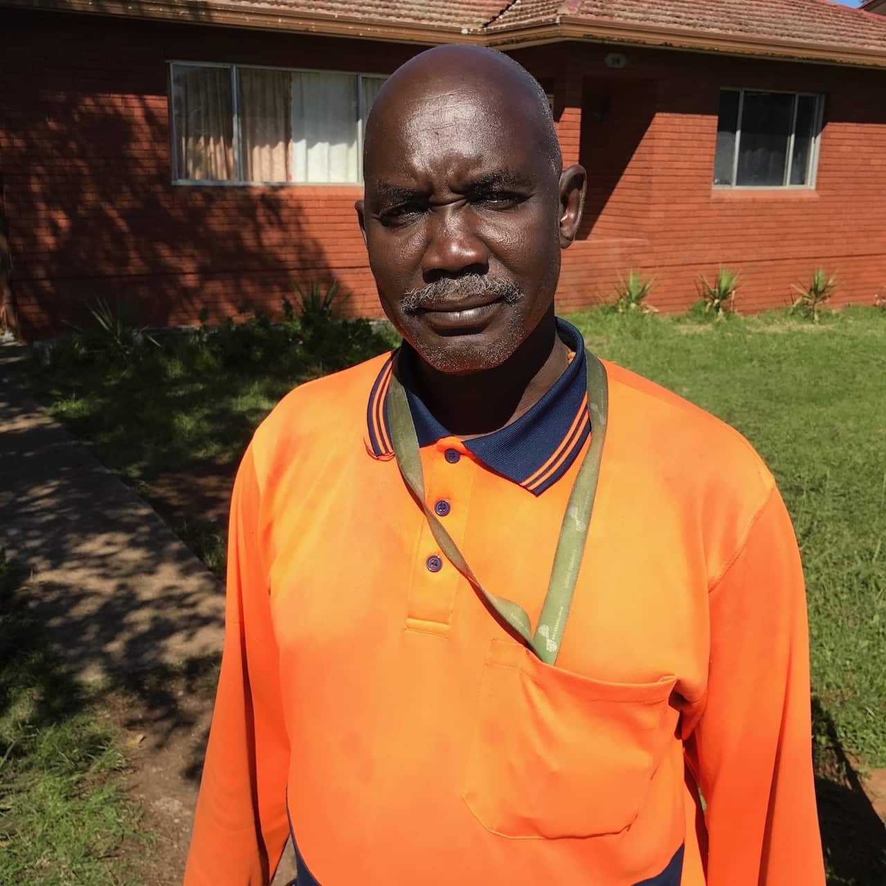 School cleaner Aoun Akut is worried about potential exposure to coronavirus at work.