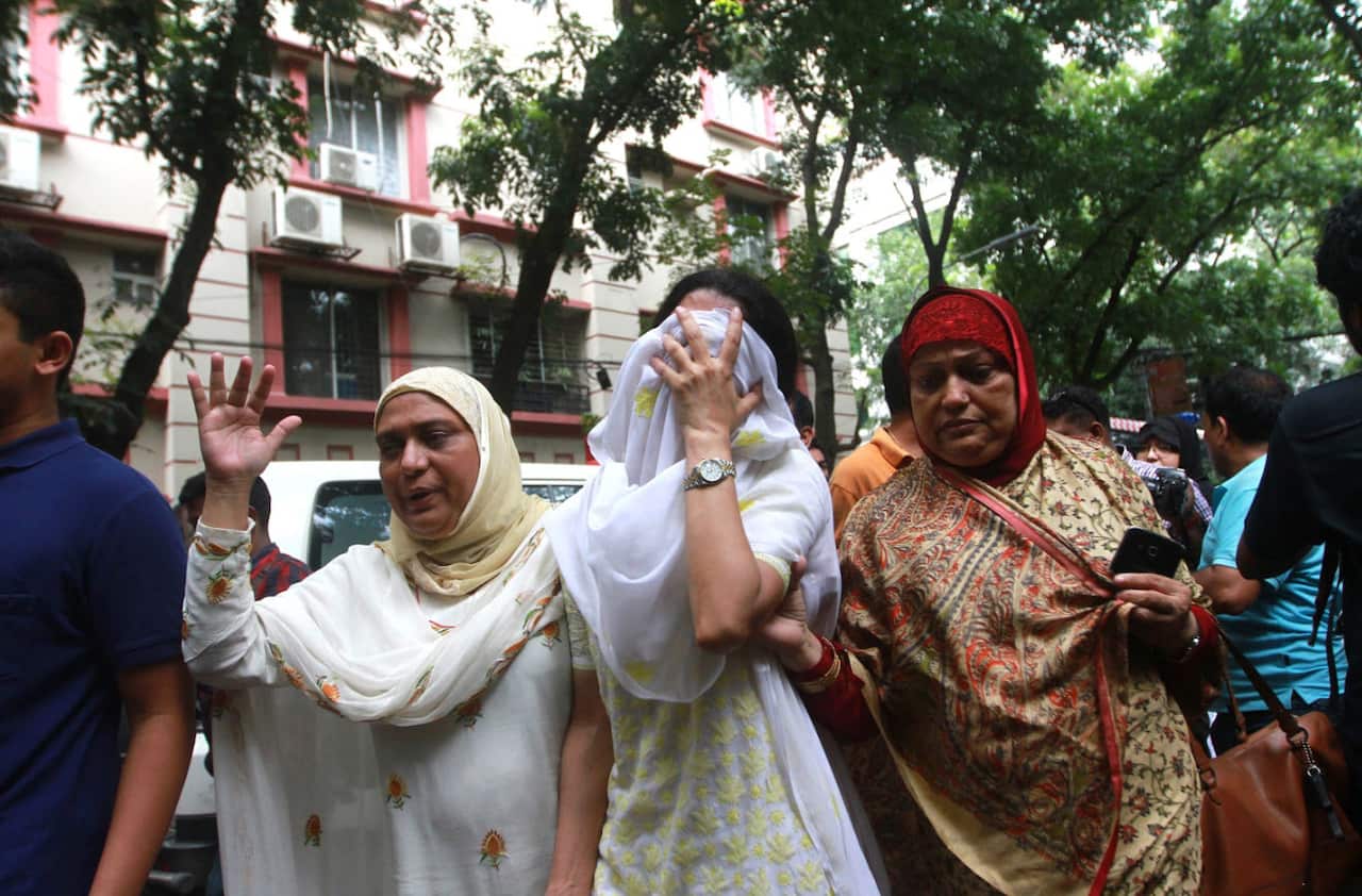 Relatives of the Dhaka terrorists attack victims mourn as they go to identify bodies from the Holey Artisan Bakery in Dhaka, Bangladesh 02 July 2016.
